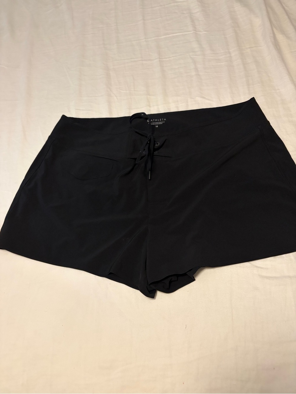 Athleta Run With It Black Running Shorts with speed zip pocket